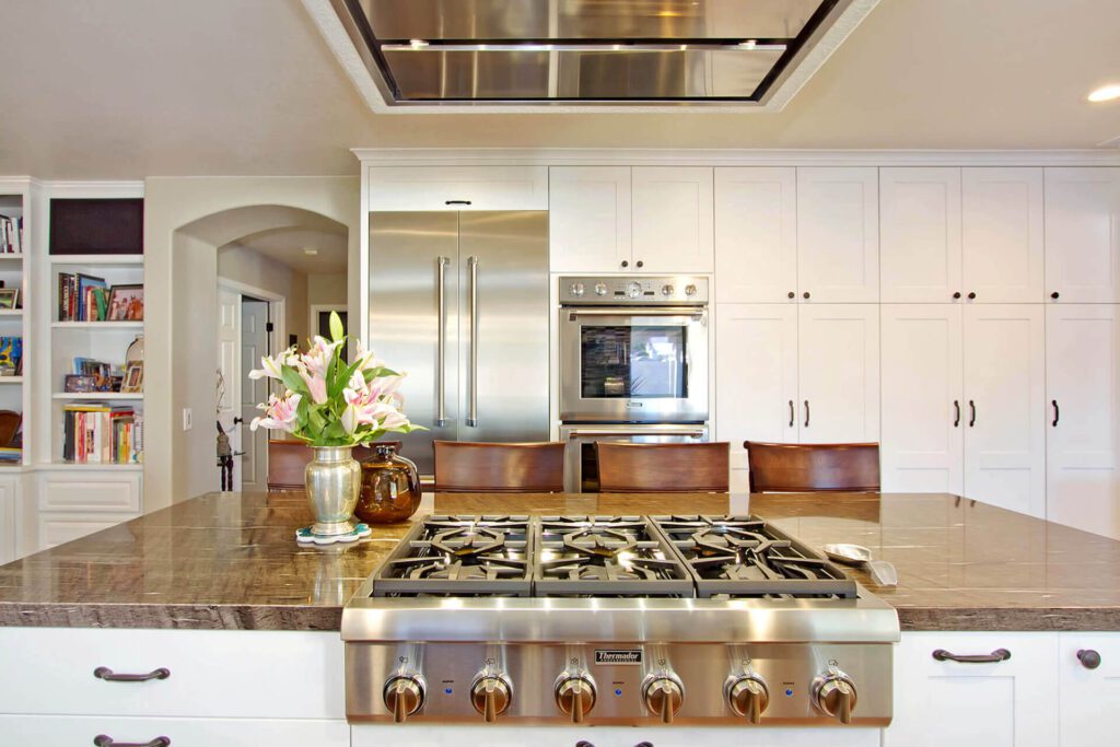 Stainless steel stove in a modern kitchen.